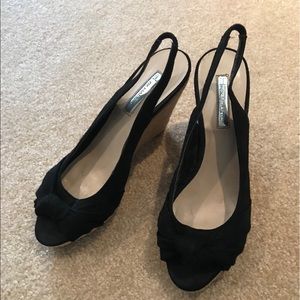 Gently worn black wedge heels